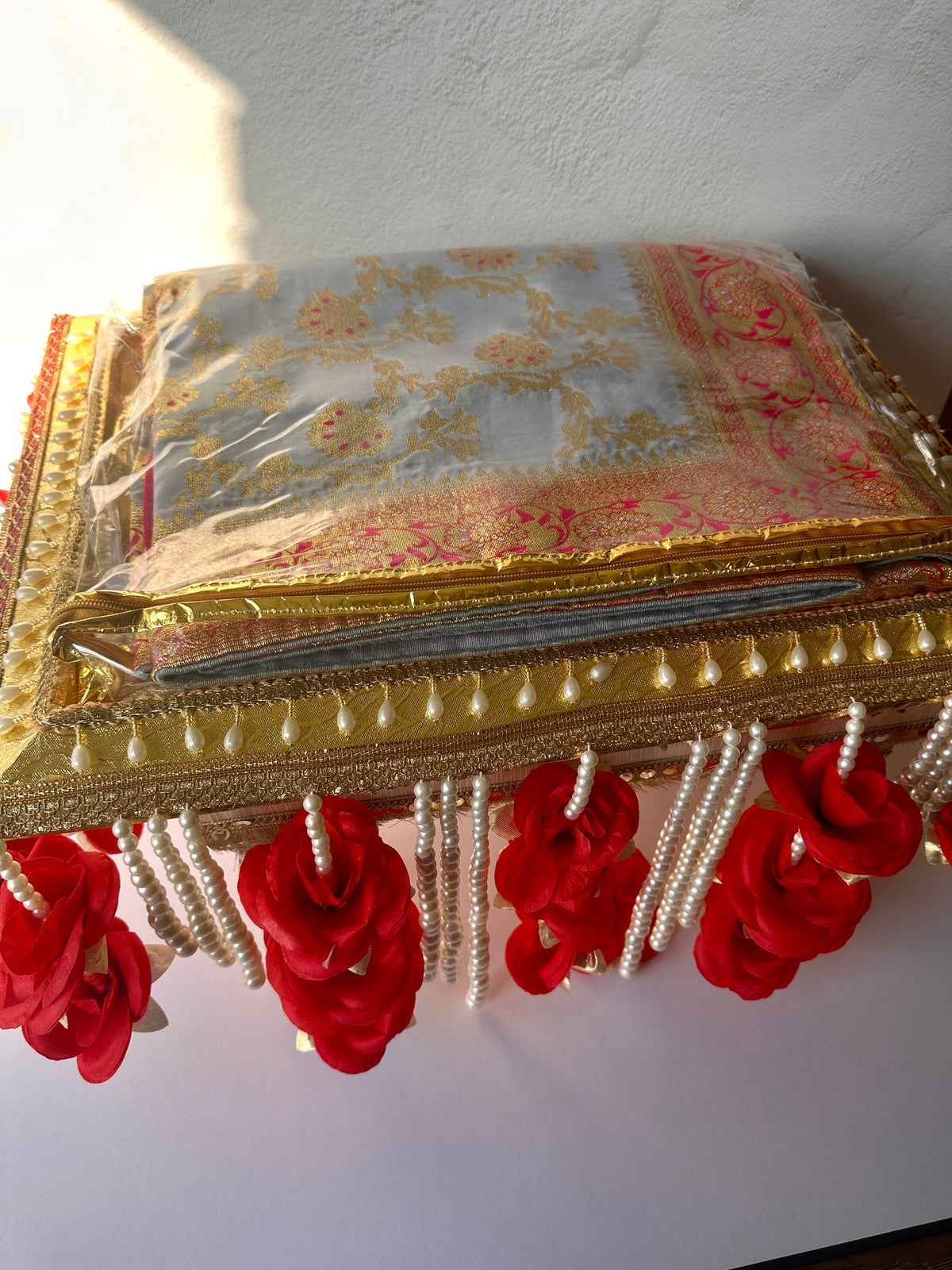 Rumala Sahib Tray | A tray with floral hangings